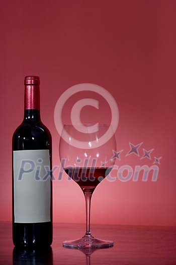 Background of a wine bottle and a wine glass