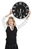 Isolated woman holding a big clock