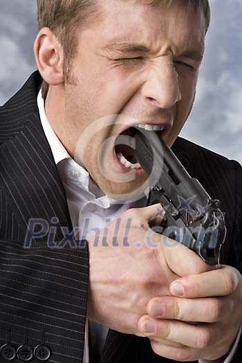 Businessman with a gun in his mouth