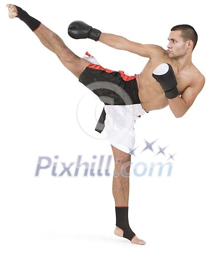 Isolated male kickbox master kicking