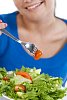 Woman eating a healthy salad