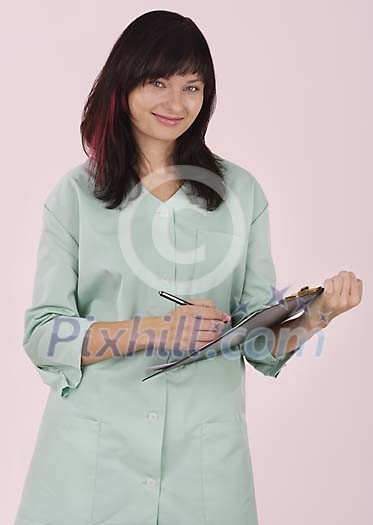Female nurse with notes Female nurse with notes