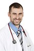 Isolated smiling male doctor