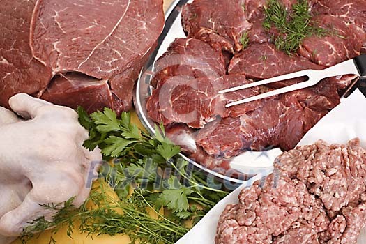 Different types of meat on the table Different types of meat on the table