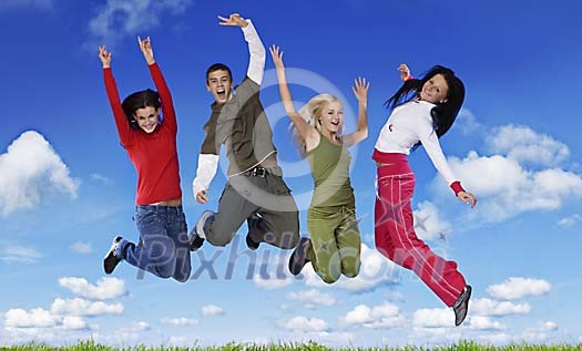 Group of teenagers jumping in the air