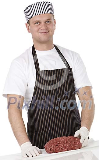Isolated male butcher packing minced meat Isolated male butcher packing minced meat