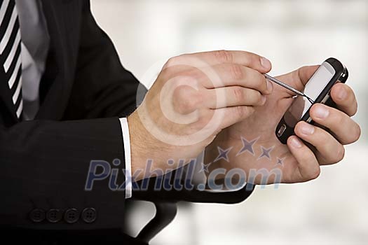 Businessman hands with a smartphone