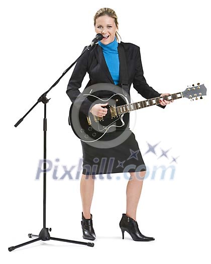 Isolated businesswoman playing a guitar and singing