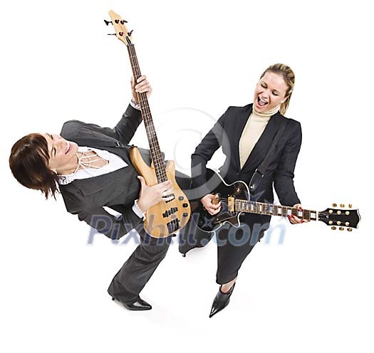 Isolated businesswomen playing guitars Isolated businesswomen playing guitars