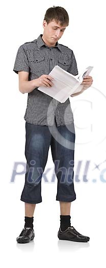 Isolated man standing and reading a book