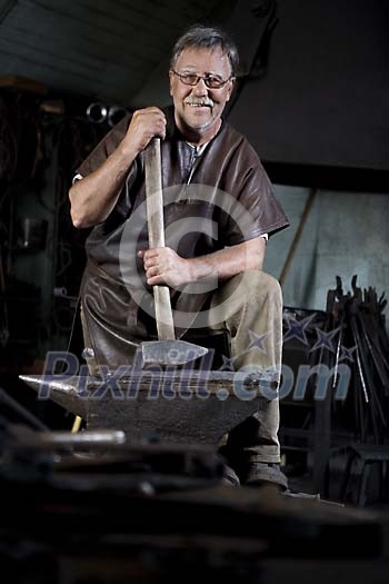 Male blacksmith with his hammer
