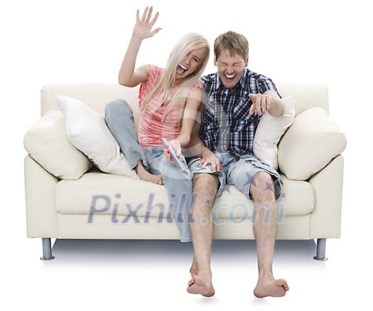 Isolated couple on the couch laughing hard