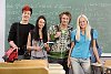Teenagers in front of the blackboard