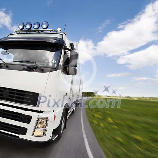 Big truck driving on the road Big truck driving on the road