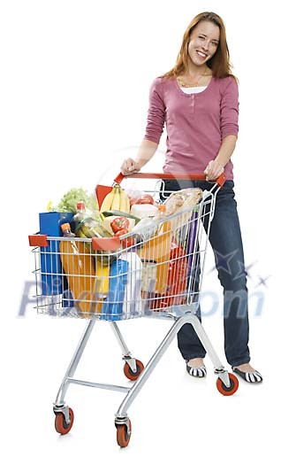 Isolated woman with a shopping cart full of groceries