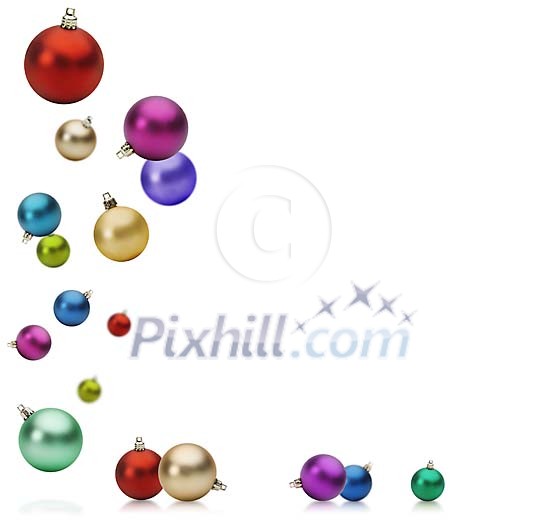 Different coloured christmasballs on a white background