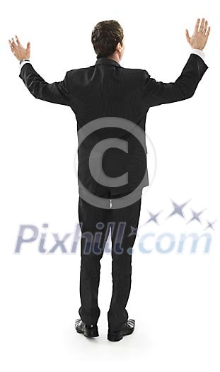 Businessman lifting arms to get attention (clipping path included)