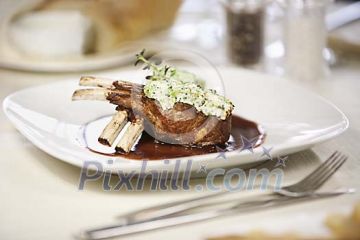 Portion of lamb carré in restaurant Portion of lamb carré in restaurant