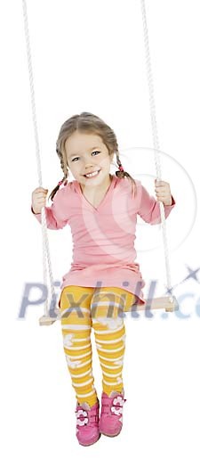 Little girl in swing isolated on white