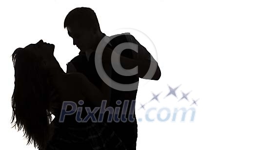 Silhouette of a dancing couple isolated on white