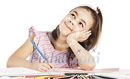 Young girl drawing with color pencils