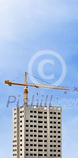High appartment house and crane