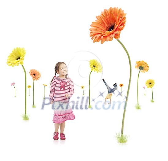 Small children playing in a fantasy flower forest