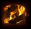Burning logs in sauna stove