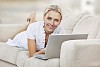 Woman on the couch with laptop