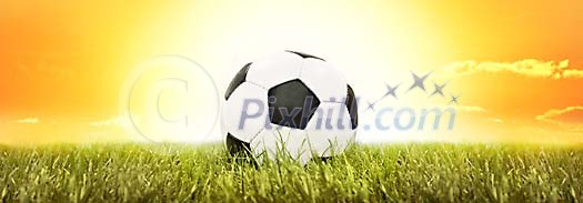 Football conceptual on grass