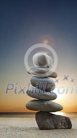 Stones balanced on the beach