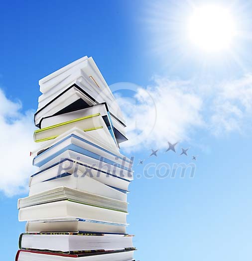Pile of books trying to reach the sun