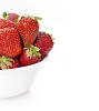 Strawberries in a bowl on white