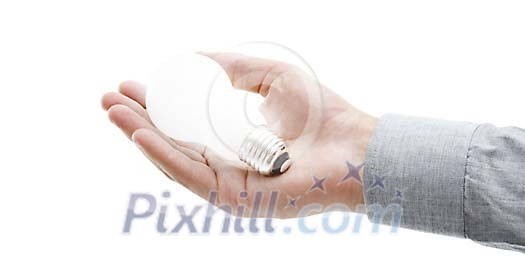 Hand holding an illuminated CFL