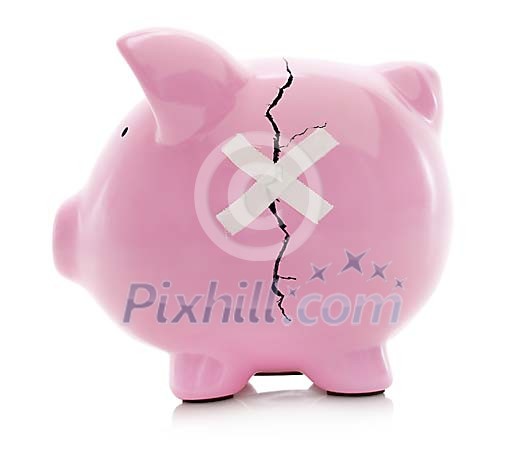 Clipped piggybank with crack on its side