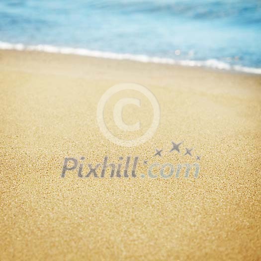 Closeup of the golden beach sand Closeup of the golden beach sand