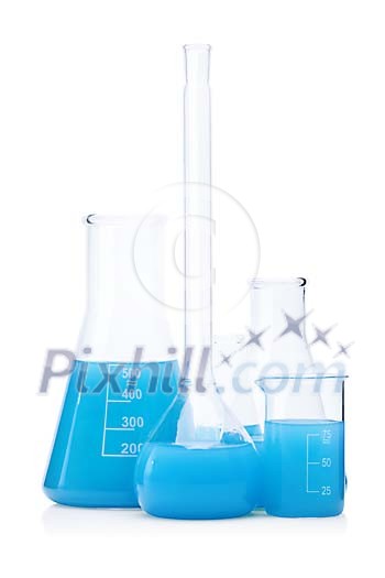 Clipped measuring glasses with blue fluid