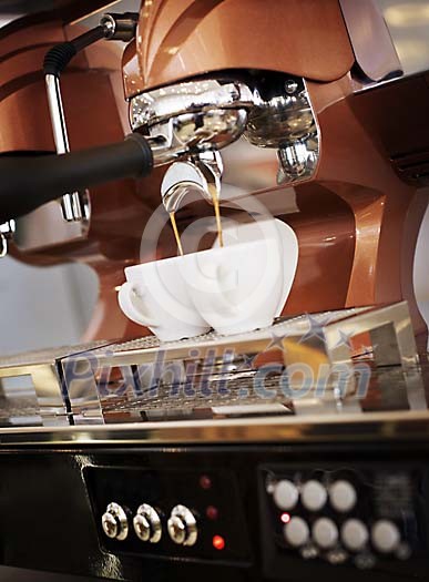 Cofee-maker prepearing coffee