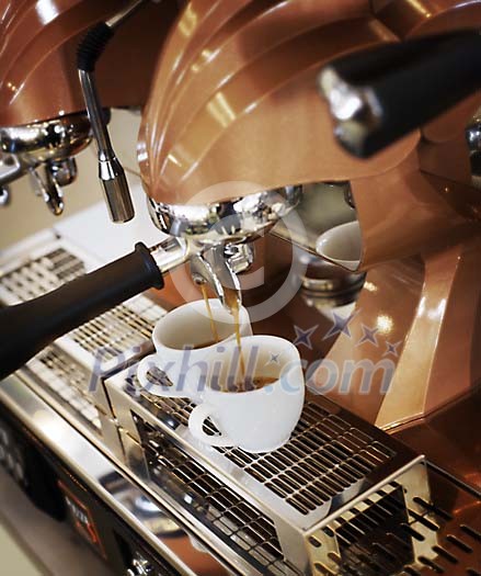 Coffee maker making coffee