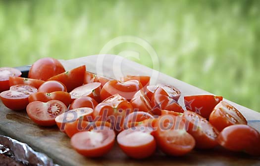 Freshly cut tomatoes on a cutting board