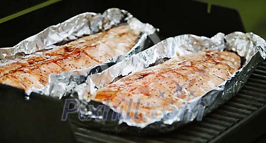Freshly cooked fish in a foil Freshly cooked fish in a foil