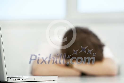 Tired man behind the desk Tired man behind the desk
