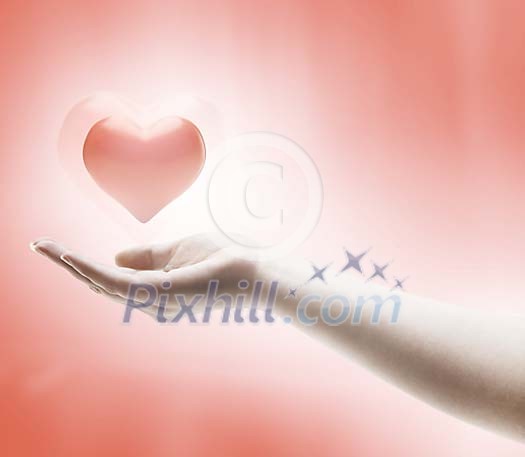 Heart floating over hand
