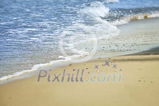 Waves rushing to a sandy beach Waves rushing to a sandy beach