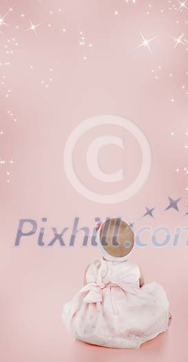 Baby girl sitting and looking at the stars on a pink background Baby girl sitting and looking at the stars on a pink background