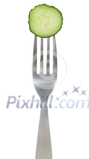Clipped fork with a slice of cucumber Clipped fork with a slice of cucumber