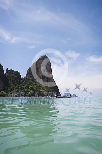 Boats at the sea and rocks on the background at Krabi, Thailand Boats at the sea and rocks on the background at Krabi, Thailand