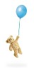 Teddy bear flying with a blue balloon