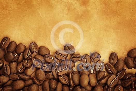 Background of coffee beans on a brown paper