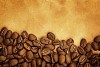 Background of coffee beans on a brown paper